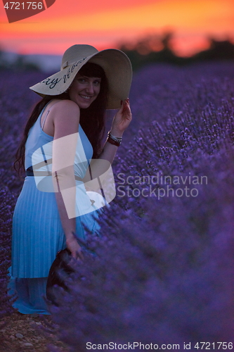 Image of woman portrait in lavender flower fiel