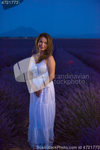 Image of portrait of and asian woman in lavender flower field