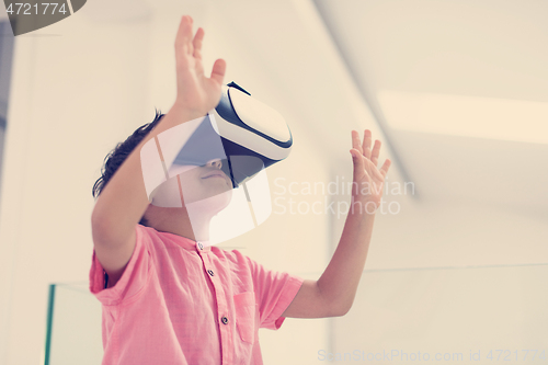 Image of kid at home wearing vr glasses