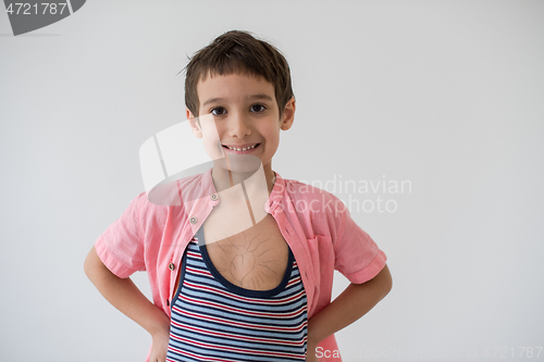 Image of lilittle boy looking at heart love symbol sketched on his chest