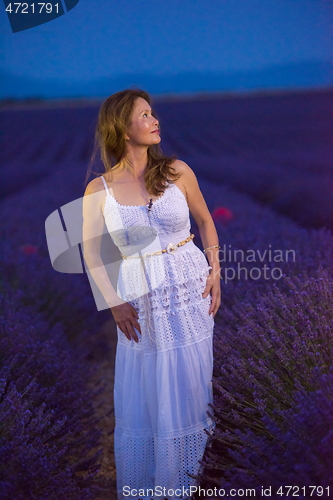 Image of portrait of and asian woman in lavender flower field