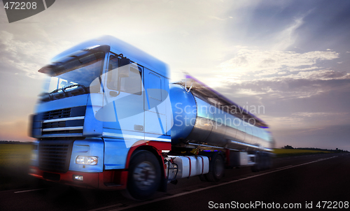 Image of truck driving at dusk/motion blur