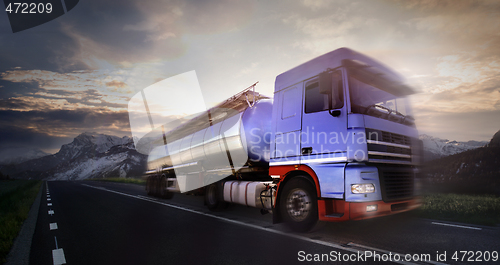 Image of truck driving at dusk/motion blur
