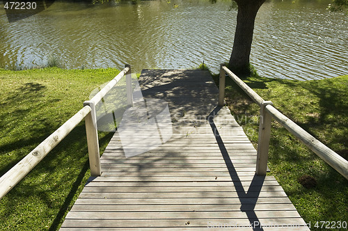 Image of Wooden pathway in a natural park