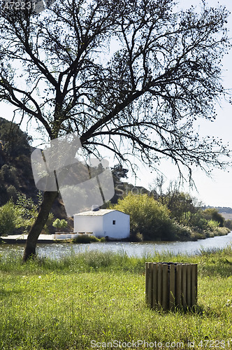 Image of Wooden waste basket in a natural park