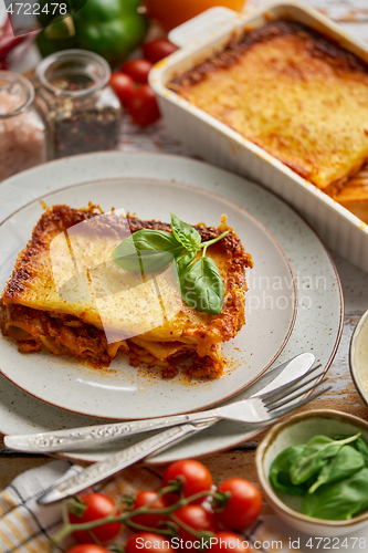 Image of Delicious lasagne bolognese with pepper, tomato and cheese