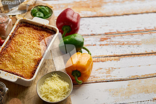 Image of Delicious lasagne bolognese with pepper, tomato and cheese