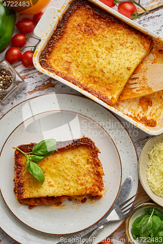 Image of Delicious lasagne bolognese with pepper, tomato and cheese