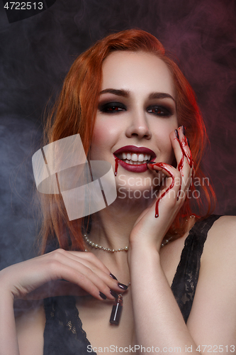 Image of Beautiful vampire young woman
