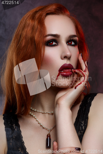 Image of Beautiful vampire young woman