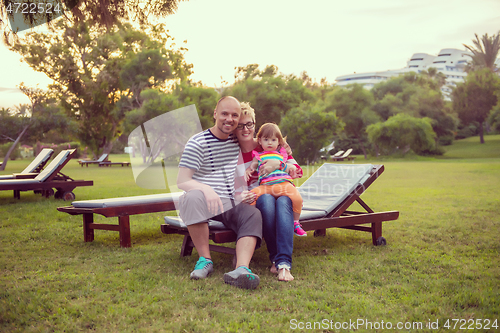 Image of portrait of young happy family