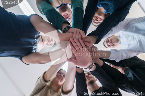 Image of students celebrating successfully finished project