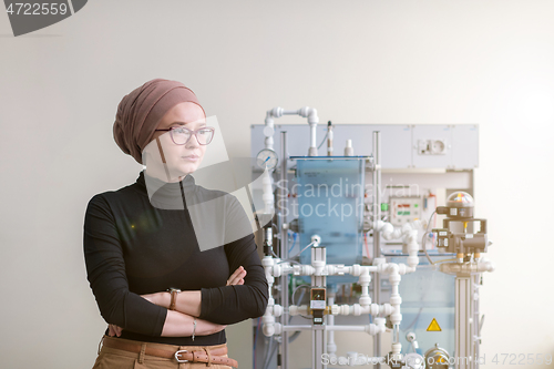 Image of portrait of muslim female student in the electronic classroom