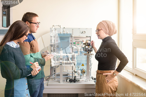 Image of young students doing practice in the electronic classroom