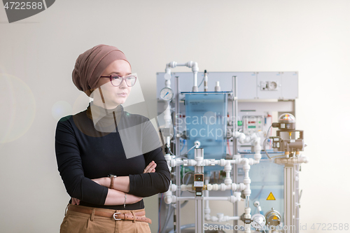 Image of portrait of muslim female student in the electronic classroom