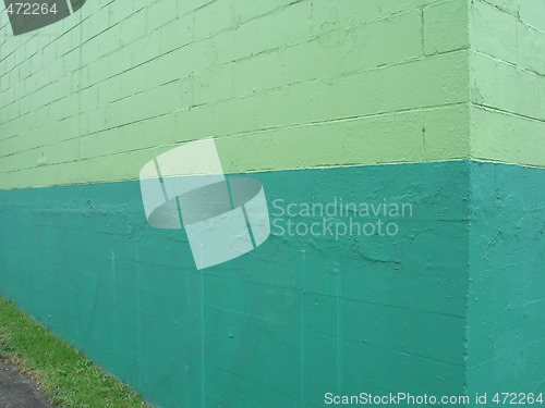 Image of green cinder blocks building