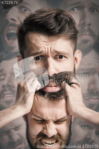 Image of Close up shot of sad and angry emotion on face of discouraged man