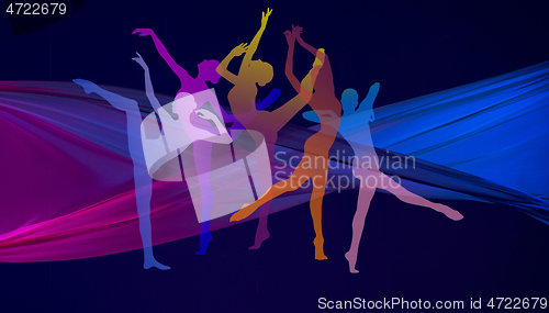 Image of Silhouettes of young graceful female ballet dancers on dark background