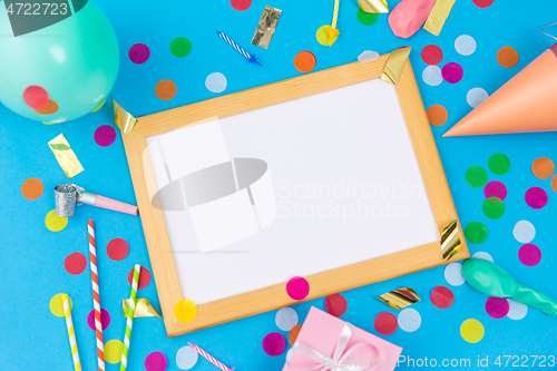 Image of white board, birthday gift and party props