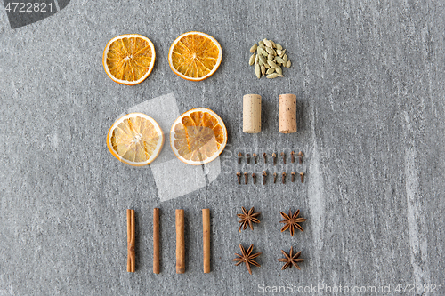 Image of dry orange, cinnamon, clove, anise and cardamom