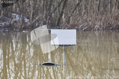 Image of Empty sign on a land