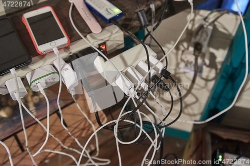 Image of Charging phones and other devices in a mess