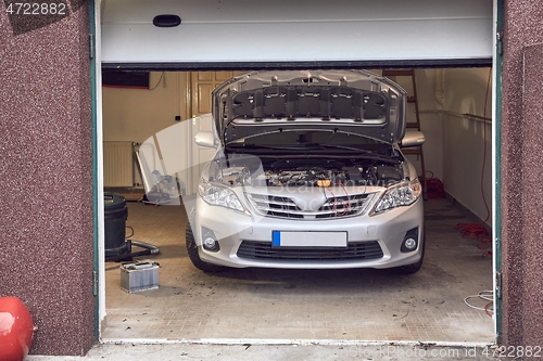 Image of Car in a repair shop garage