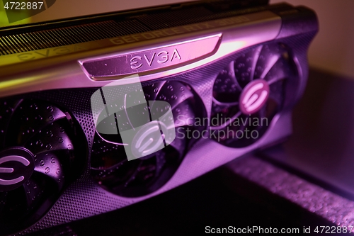 Image of Geforce RTX 3090 Nvidia GPU graphics card inside a gaming computer configuration