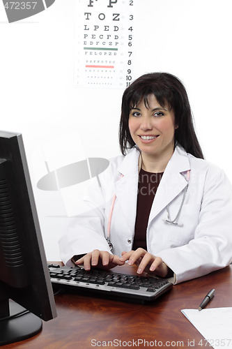 Image of Eye doctor at computer