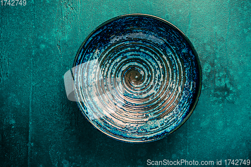 Image of Pottery bowl or ceramics in green and blue tone