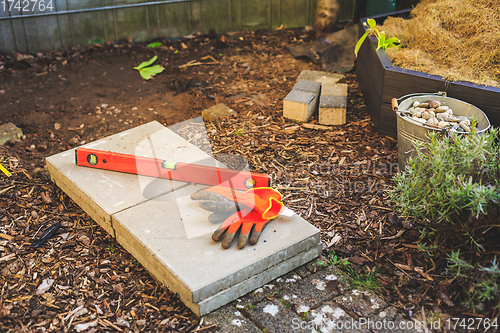 Image of Building garden path or base in garden