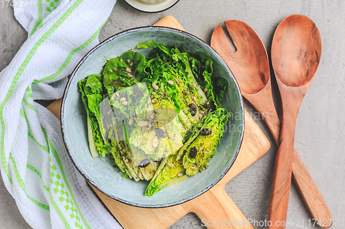 Image of Lettuce salad with olive oil dressing