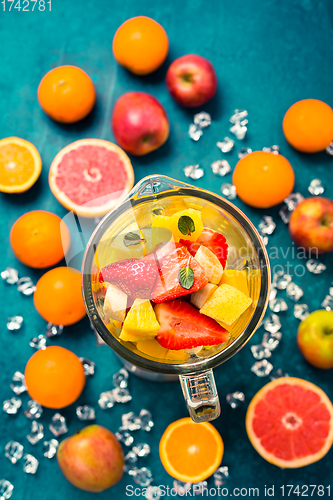 Image of Variation of fruits in mixer. Preparing milkshake or smoothie