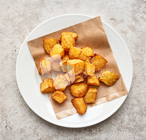 Image of portion of fried potatoes