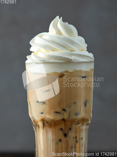 Image of iced coffee latte with whipped cream