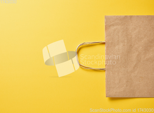 Image of paper bag on yellow background