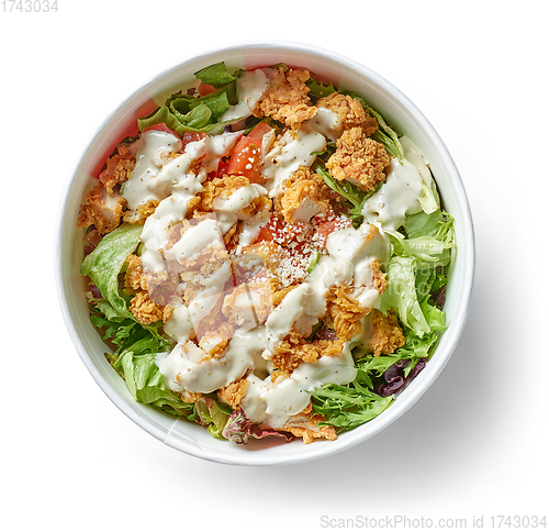 Image of caesar salad with fried chicken meat