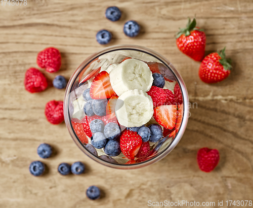 Image of glass of fresh banana and berries