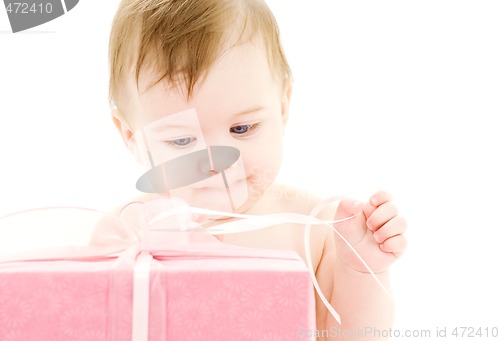 Image of baby boy with big gift box