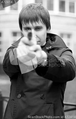 Image of man with gun
