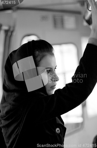 Image of unhappy woman in a bus