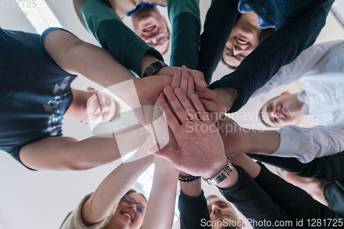 Image of students celebrating successfully finished project