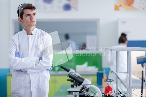Image of portrait of medical student in white coat