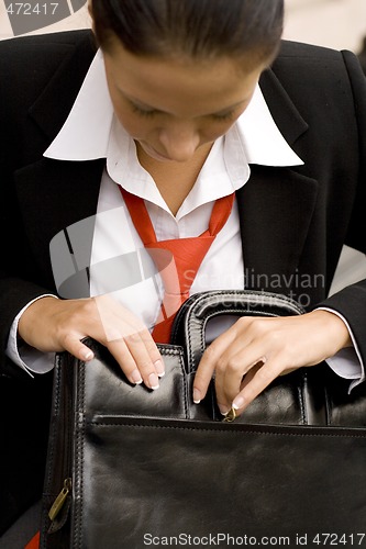 Image of businesswoman with briefcase