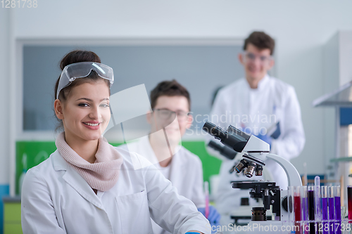 Image of Group of young medical students doing research