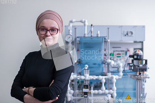 Image of portrait of muslim female student in the electronic classroom