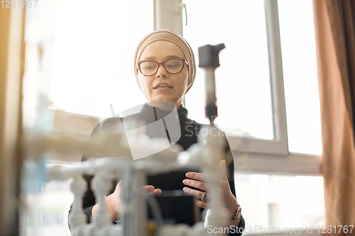 Image of portrait of muslim female student in the electronic classroom