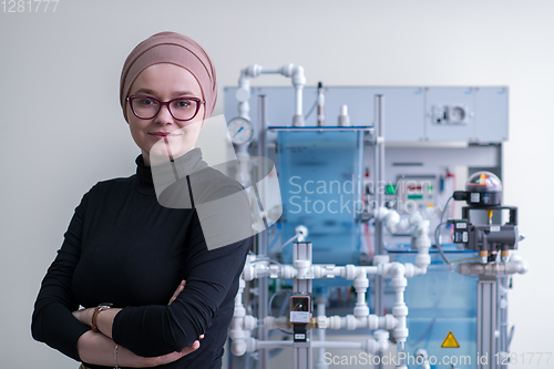 Image of portrait of muslim female student in the electronic classroom