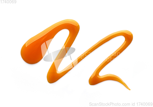 Image of caramel sauce on white background