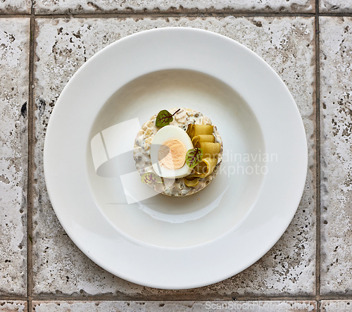 Image of portion of olivier salad